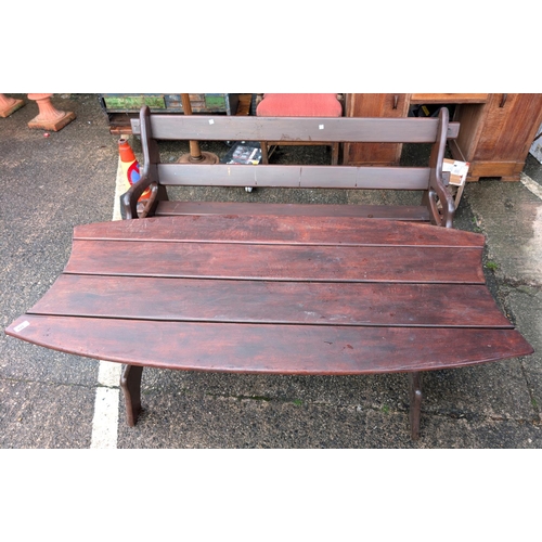 922 - A stained wood garden table and a similar stained wood garden bench.