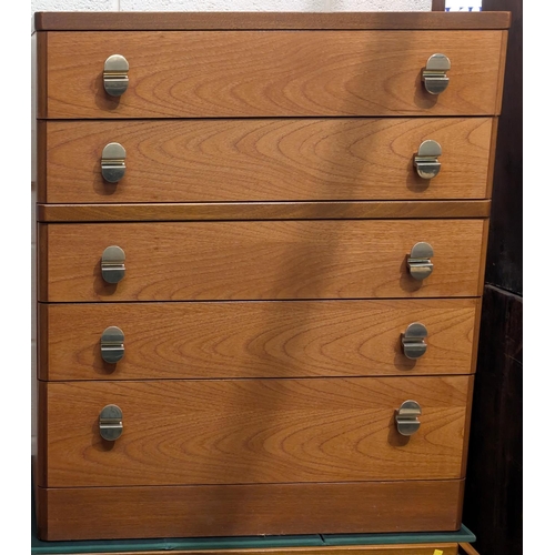 936 - A Stag teak chest of five drawers and a matching desk/dressing table.