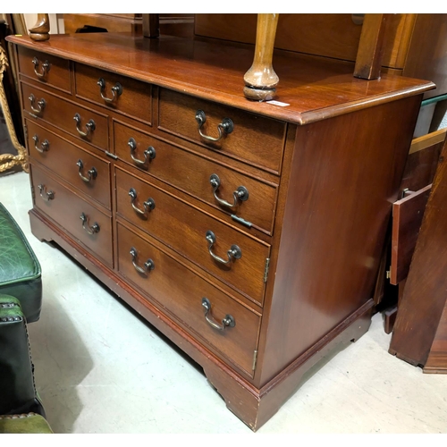 938 - A reproduction mahogany chest with hinged lid disguised by drawers and cupboards, length 115cm, and ... 