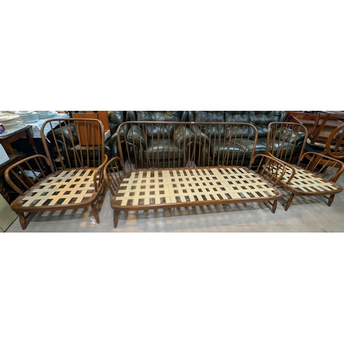 946 - An Ercol three piece low seat settee and and two arm chairs