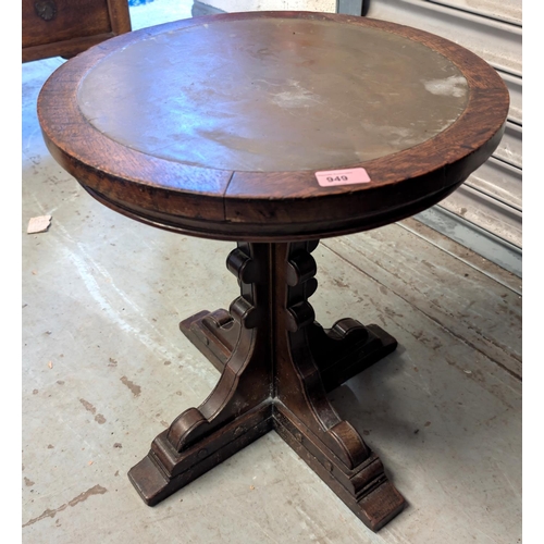 949 - A Waring & Gillows oak occasional table circular top with leather insert top