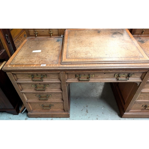 963 - Galloway and Sykes Aberdeen:- an Arts and Crafts oak kneehole desk with 2 raised 3 height galleried ... 