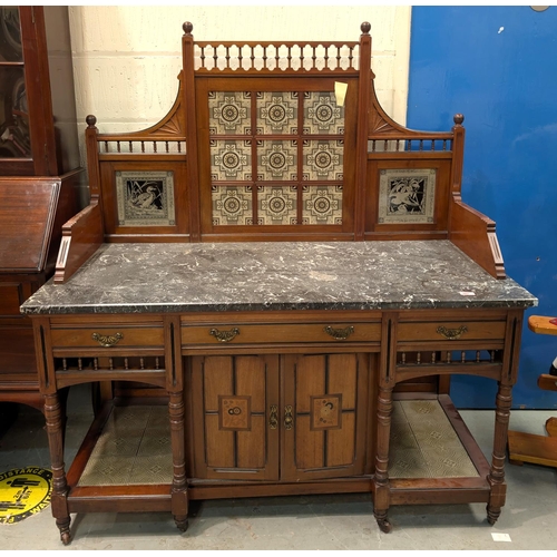 967 - E. Goodall and Co. Manchester: a large late 19th Century washstand with raised tile back in the Mint... 