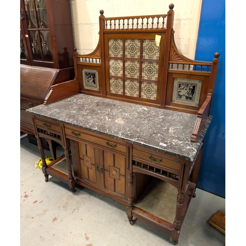 967 - E. Goodall and Co. Manchester: a large late 19th Century washstand with raised tile back in the Mint... 