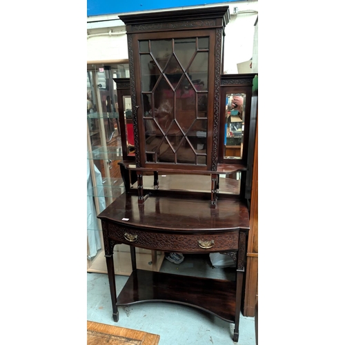 968 - An Edwardian Chippendale style mahogany display cabinet with blind fret and pierced decoration, the ... 