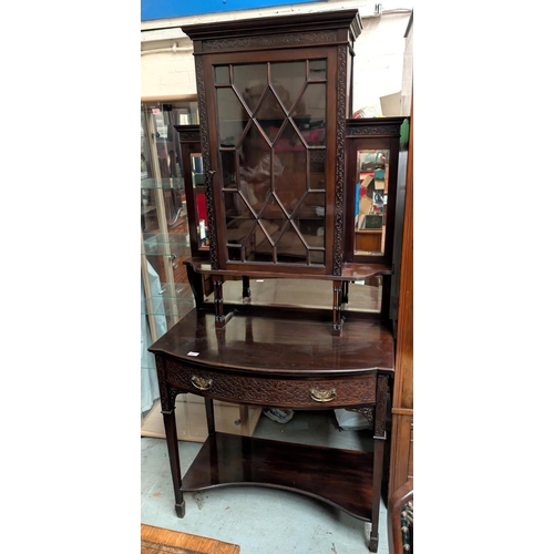 968 - An Edwardian Chippendale style mahogany display cabinet with blind fret and pierced decoration, the ... 