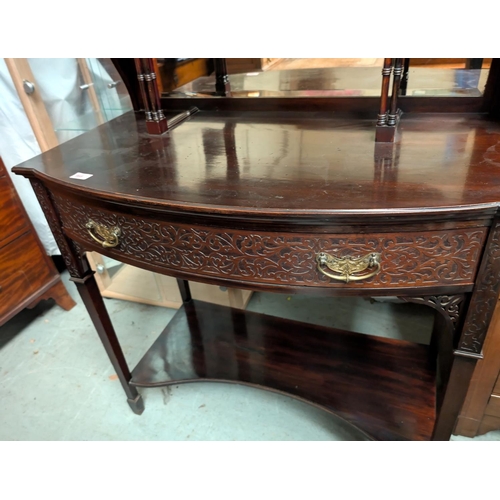 968 - An Edwardian Chippendale style mahogany display cabinet with blind fret and pierced decoration, the ... 