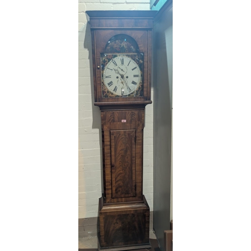 996 - An early 19th Century figured mahogany long case clock with arched painted dial and eight day moveme... 