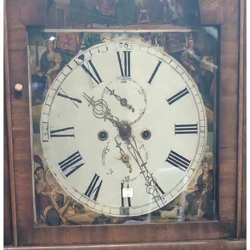 996 - An early 19th Century figured mahogany long case clock with arched painted dial and eight day moveme... 