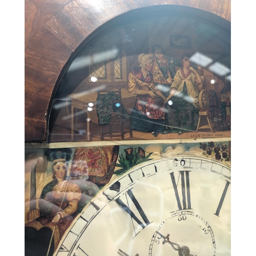 996 - An early 19th Century figured mahogany long case clock with arched painted dial and eight day moveme... 