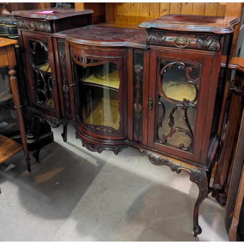 1046 - A 19th century mahogany side cabinet with glazed doors and drawers 