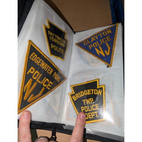 75 - A collection of obsolete USA Police cloth patch badges (approx. 60).