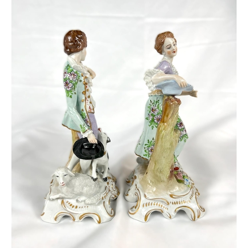 443 - A pair of Sitzendorf porcelain figures of a shepherd and shepherdess in 18th Century dress; an UNTER... 