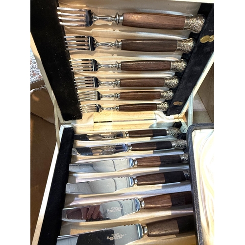 694 - A cased set of ornate steak knives and forks; boxed and loose silver plate etc.