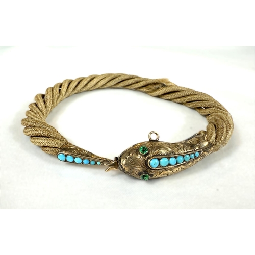 741 - A Victorian rope twist hair bracelet with yellow metal clasp in the form of a fish inset with turquo... 