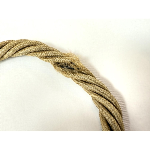 741 - A Victorian rope twist hair bracelet with yellow metal clasp in the form of a fish inset with turquo... 