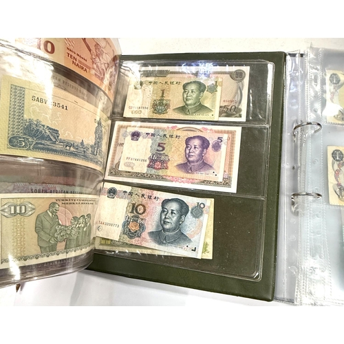 242 - WORLD BANKNOTES - a collection in album. Includes Turkey, Germany, China etc (over 30 notes) and ano... 