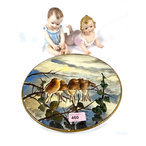 460 - A 19th Century circular wall plaque with birds, 