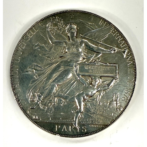 269 - PARIS EXPOSITION 1878, a silver medal signed CHAPLAIN awarded to W. M. CHRISTY and SONS, 156gm.