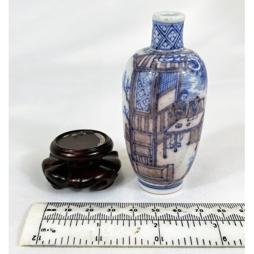 414 - A Chinese small ceramic vase with blue and red decoration, six character mark to base, with stand (a... 