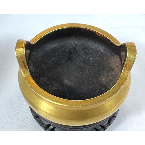 420B - A Chinese gilt bronze censer on fitted wooden stand, 6 character impressed seal mark to base, 2 hoop... 