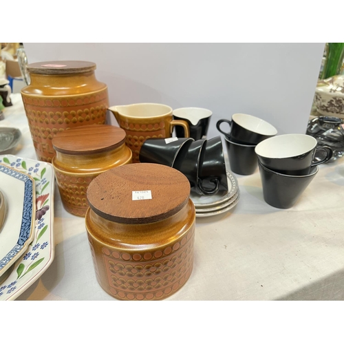 428 - A Robert Welch 1960's Cotswold part tea set, storage jars and meat dishes.