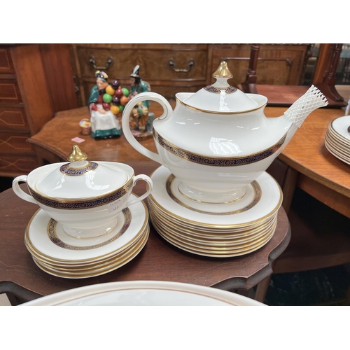 488 - A large Royal Doulton Harrow dinner and tea service.