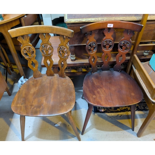 1029 - A pair of Ercol dining chairs