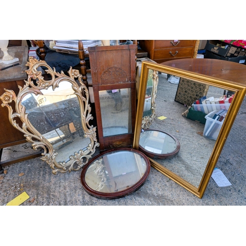 27 - An inlaid Sheraton-style mirror, two gilt framed and another.