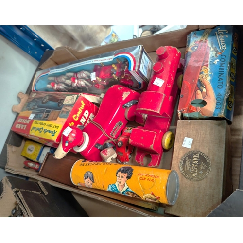 329 - A selection of vintage toys - some in original boxes.