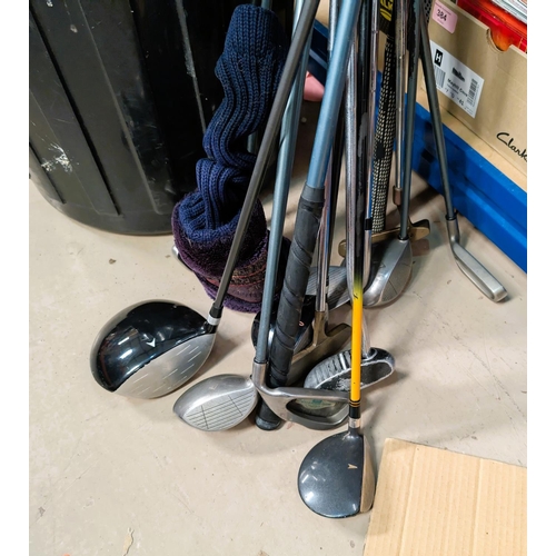 40 - A selection of gold clubs and golf related items etc.