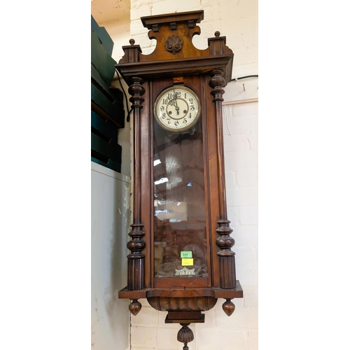 62 - A mahogany cased Vienna wall clock, spring driven.