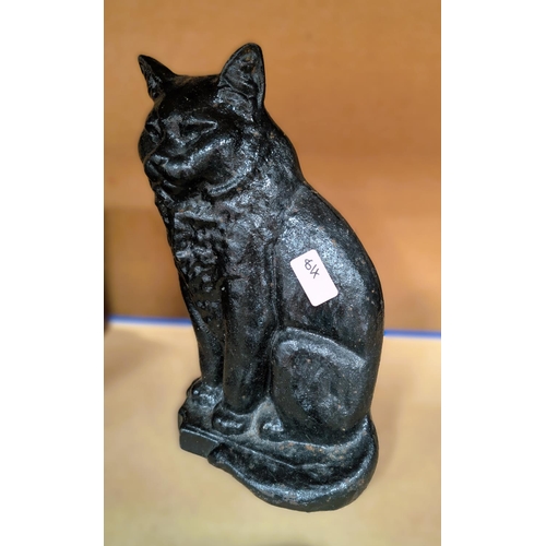 84 - A cast iron cat door stop and various Asian pictures etc.