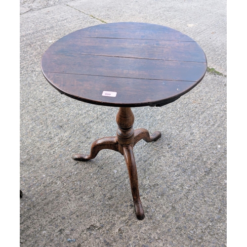 999 - An 18th century Country made oak pedestal occasional table.