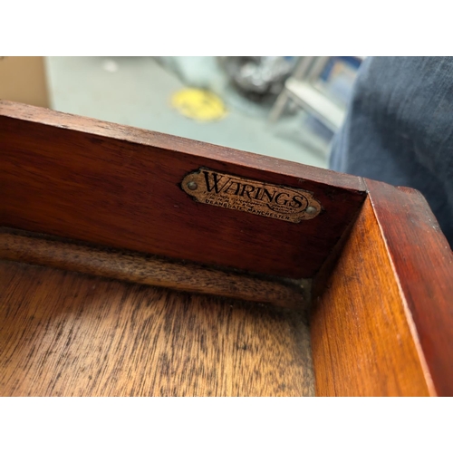 1041 - A Waring and Gillows envelope card table with various fretwork etc.