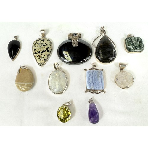 791 - A selection of pendants set with natural stones including labradorite, haematite, amethyst, granite ... 