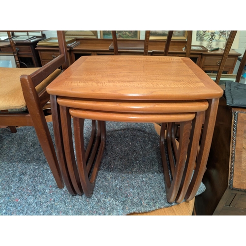 1014 - A nest of three 1970's G-Plan style teak occasional tables.