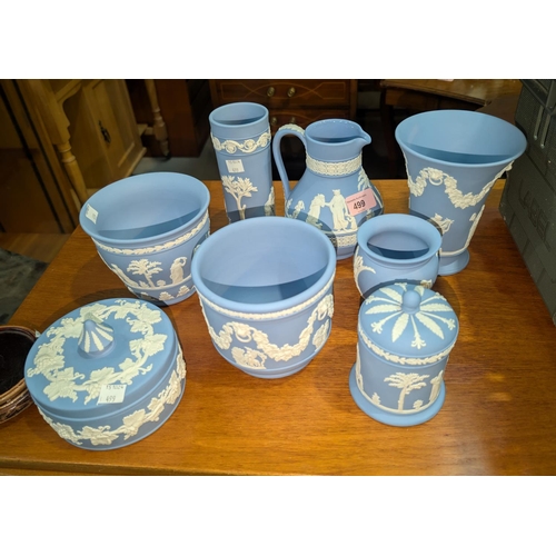 499 - Wedgwood: A Wedgwood jug, lidded trinket ware vases, small urns etc.