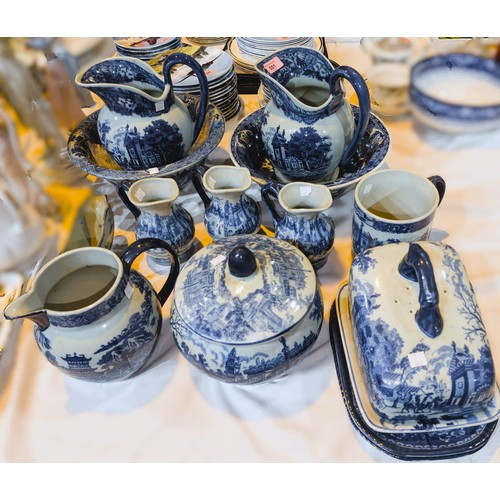 501 - Two blue and white jug and bowl sets; a large blue and white mug; cheese cover tureen etc.