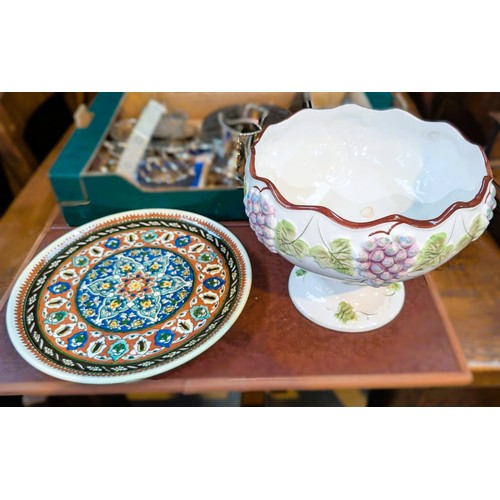 551A - A circular Persian/Afghan pottery tray and a pedestal bowl.No bids sold with next lot