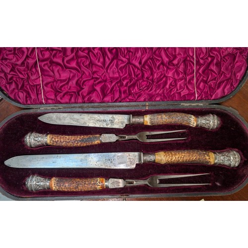 737D - An originally boxed antler handle carving set.