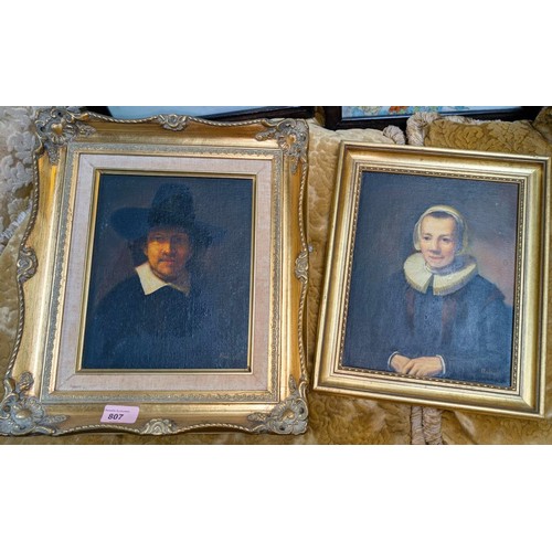 807 - A pair of 20th century portraits of 18th century male and female in traditional dress, in gilt frame... 