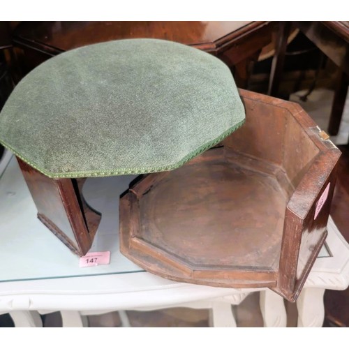 998 - An octagonal Burrwood and inlaid footstool with green velvet top with concealed hinged opening base.