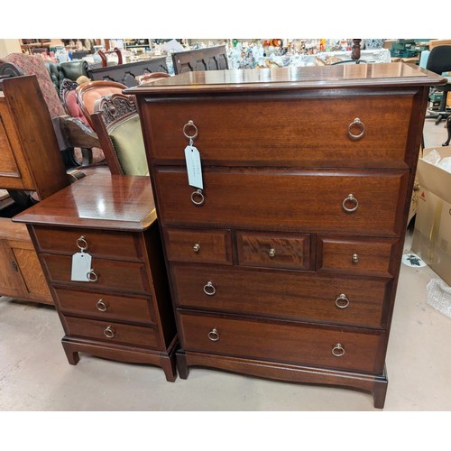 842 - A Stag Minstrel mahogany chest of 4 long and 3 short drawers ans similar bedside cabinet