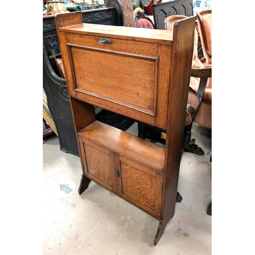 842D - A 1930's oak secretaries with fall front and shelves below