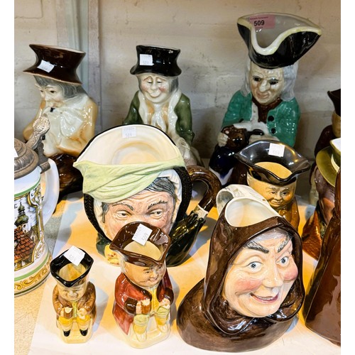 509 - A collection of Royal Doulton and other various character jugs etc.