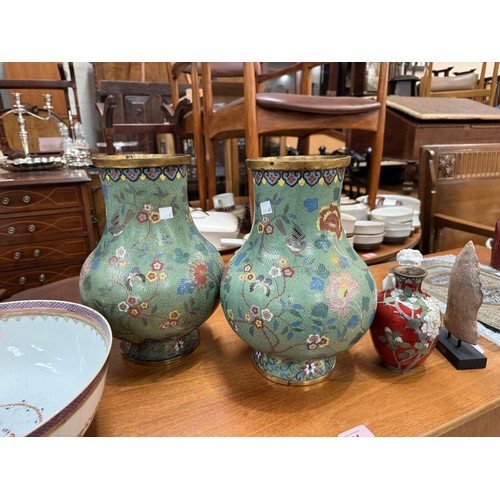 623A - A large mirror pair of 19th century Chinese cloisonne vases with gilt rims and feet, in sage green w... 