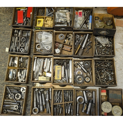 108 - A toolmakers cabinet with 20 drawers with taps and dies, nuts and bolts.