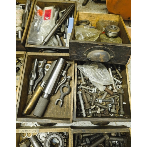 108 - A toolmakers cabinet with 20 drawers with taps and dies, nuts and bolts.