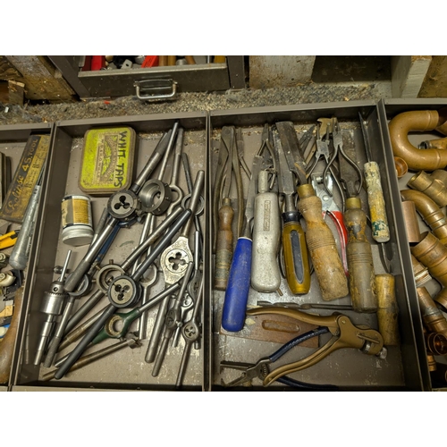 111 - A cabinet containing vintage taps, dies, chisels, files, Stanley knives etc (one drawer missing, one... 